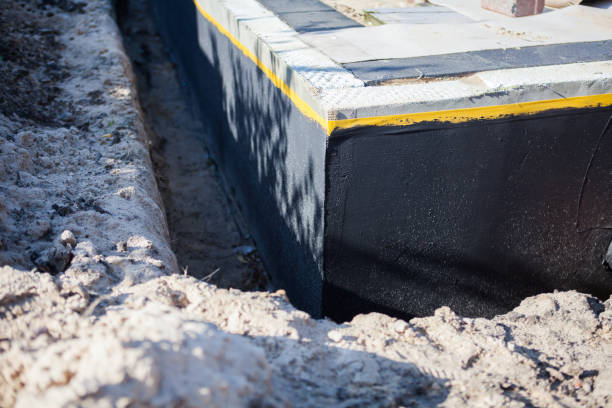 Professional Waterproofing technician working in Ortonville, MN